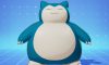 feature image for our pokemon unite tier list, the image features a photo of snorlax