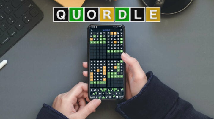 A person playing Quordle on their phone