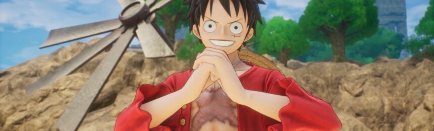The featured image for our One Piece Odyssey Yaya Cubes guide, featuring the character Luffy from the game. He stands on a beach, cracking his knuckles together as he looks directly at the camera, smiling. He is wearing an open red shirt.