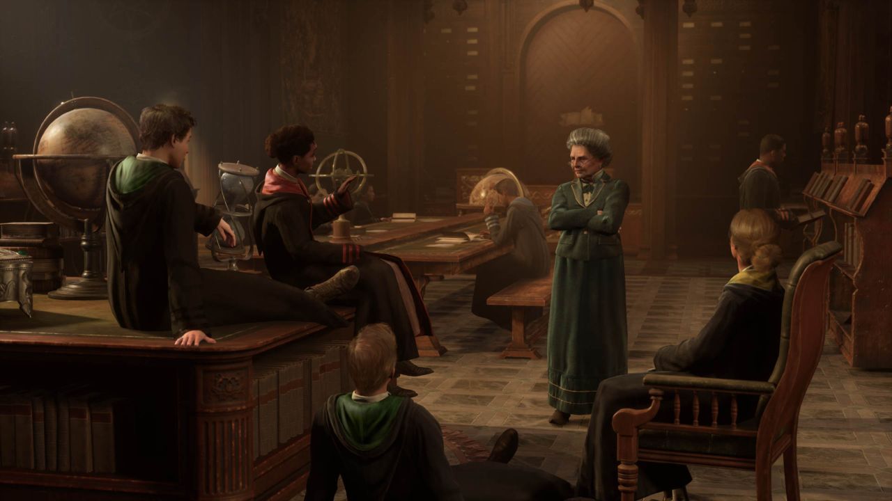 Feature image for our Hogwarts Legacy chest with eye guide. It shows a talk taking place between some Hogwarts students and a teacher.