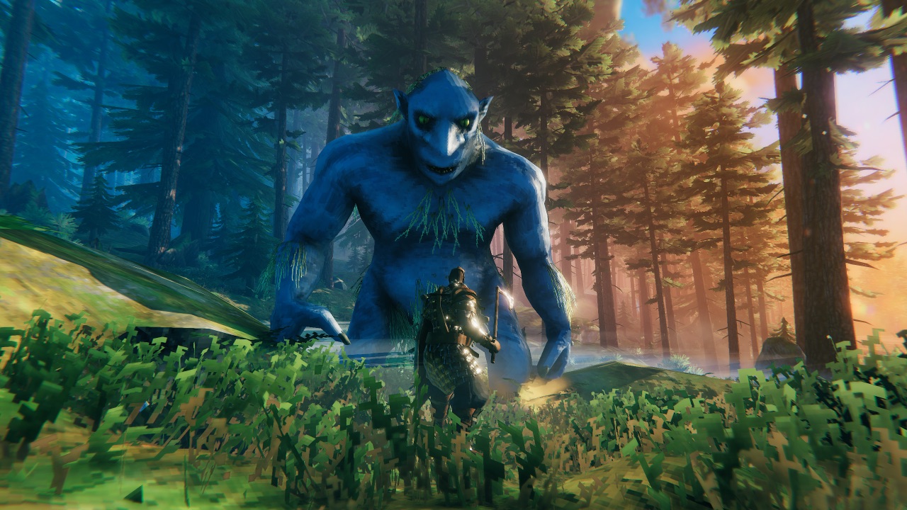The featured image for our Valheim Weapon tier list, featuring a Valheim character facing down against a huge troll in a forest.