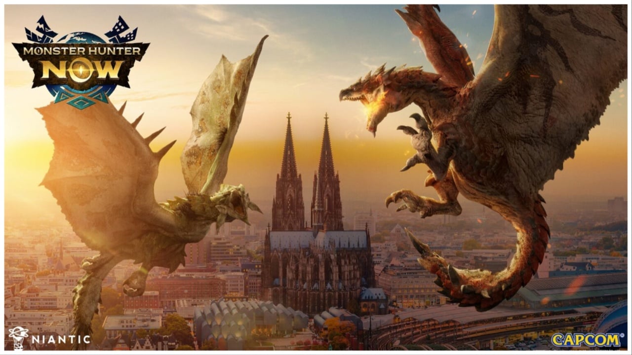 The image shows two monsters taking to the skies to clash and fight. The sunset highlights the city beneath them.
