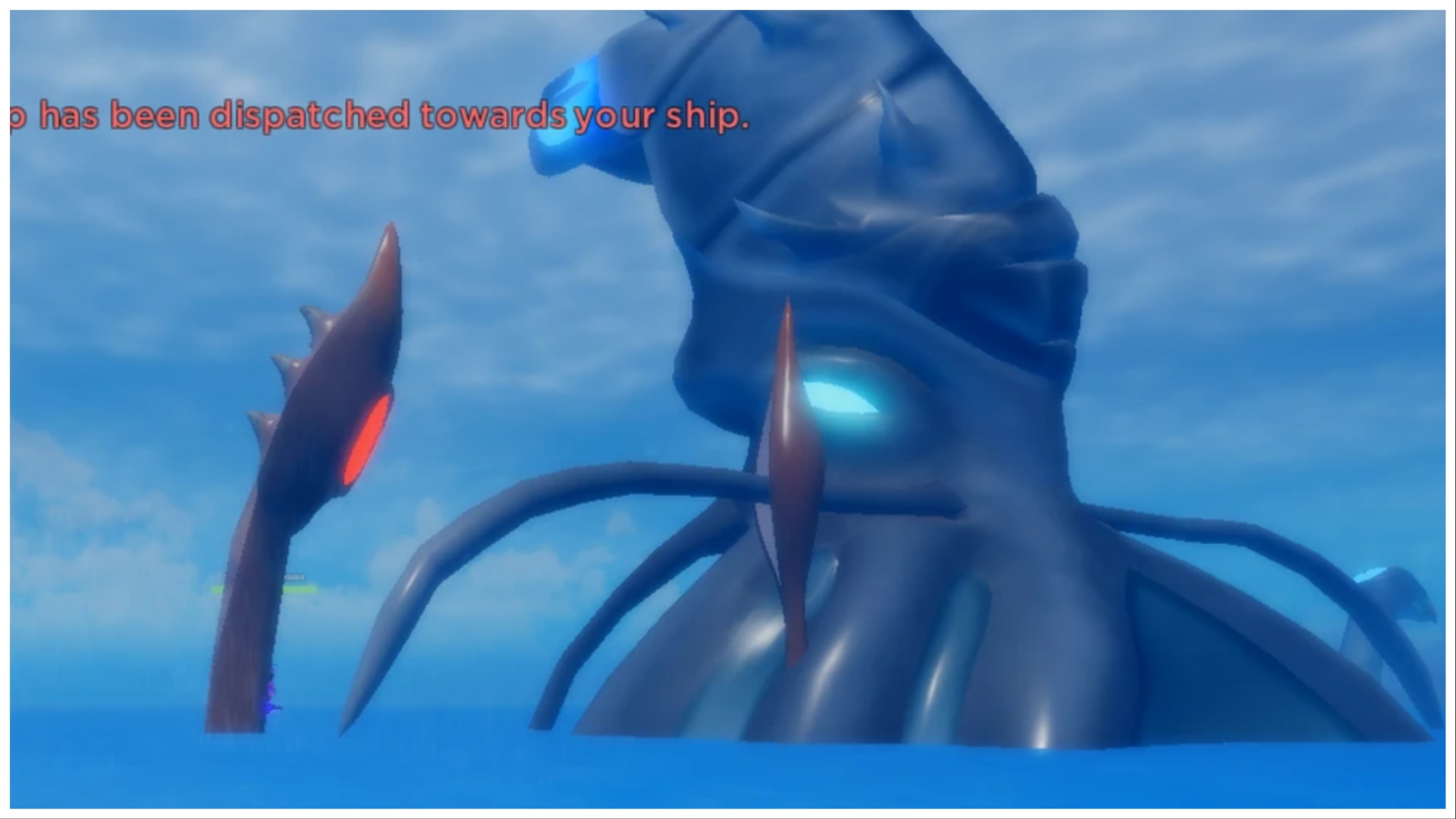 the image shows an upclose of the blue armoured kraken. The squid like beast has its head and a few tentacles sprouting from the water. Its eyes are glowing blue!