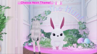 screenshot of a roblox player standing in front of the giant bunny for the dress to impress the hunt event, there are bushes, flowers, and easter eggs surrounding it, as a sign stands behind on an arch that reads 'the hunt'