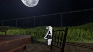 screenshot from the lobby of anomaly watch as a roblox player stands by the grass looking toward the metal fence as a large moon glows high in the sky with stars around it, there is tall grass within the area behind the metal fence, as long as large crosses stuck in the ground, in the foreground there is a wooden table and chairs
