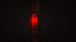 DOORS Paradox screenshot showing a view from inside a locker, with the red glowing trail behind Cue visible in the darkness.