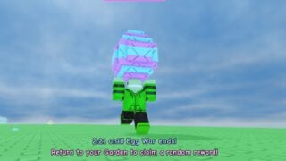 A screenshot from Grow A Garden, showing a player character running across the field holding a huge blue and pink striped Easter egg. A screenshot from Grow A Garden, showing a player character running across the field holding a huge blue and pink striped Easter egg.